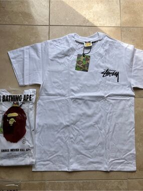 Stussy White Short Sleeve Tee with Black Logo